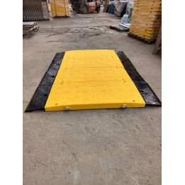 Rampe de passage pour véhicules lourds